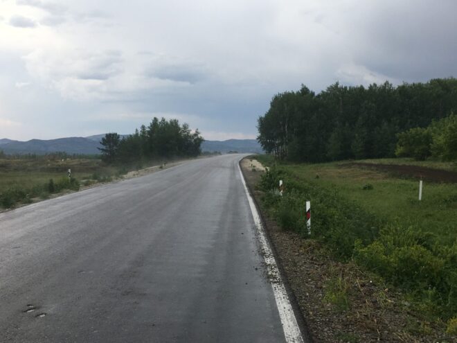 На фото слабо видны испарения воды от асфальта, но они есть )
